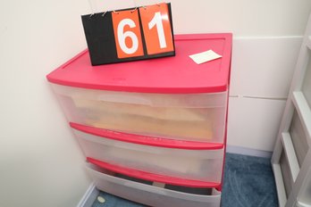 61 - PLASTIC STORAGE WITH CLIPPINGS