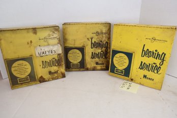 LOT 52 - THREE EARLY METAL YELLOW CABINETS AND CONTENTS