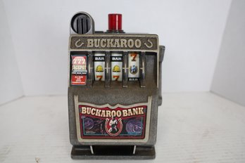 LOT 53 - VINTAGE PLASTIC SLOT MACHINE 'BUCKAROO BANK'