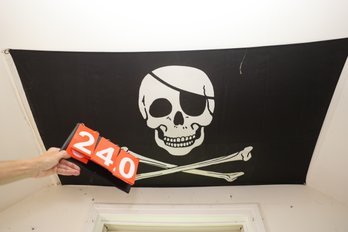 240 - PIRATE FLAG (ON CIELING BUYER TO REMOVE)