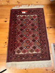 60 - HANDWOVEN RUG