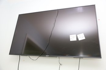 314 - 55' SONY TV WITH WALLMOUNT AND REMOTE - (WE REMOVED IT FROM THE WALL FOR YOU!)