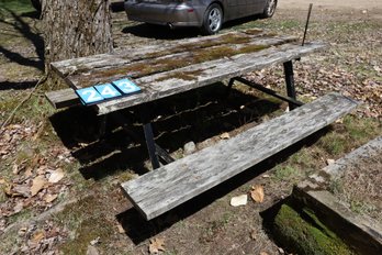 LOT 243 - PICNIC TABLE - FRAME IS METAL , COULD REPLACE BOARDS