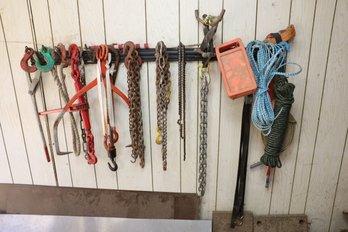 LOT 264 - MANY CHAINS AND OTHER TOWING RELATED ITEMS