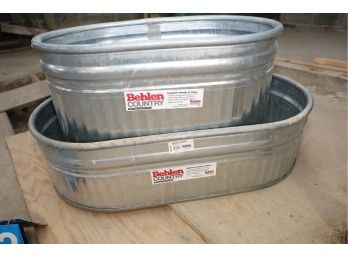 2 GALVANIZED TUBS - MARKED 132 - IN BARN