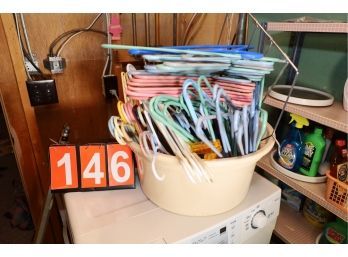 LOT 146 - PLASTIC TUB OF HANGERS