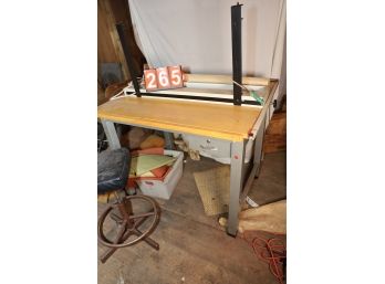 LOT 265 - DRAFTING TABLE AND CHAIR AND ITEMS ON IT AND IN IT