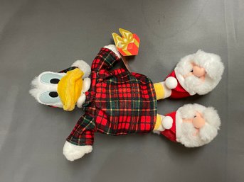 Sleepy Donald Duck With Santa Slippers