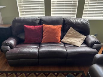 Wine Colored Faux Leather Reclining Couch 7' Long