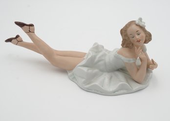 Porcelain Doll Of Girl Laying Down