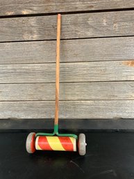 Vintage Childs Push Toy Walk And Roll Push Toy