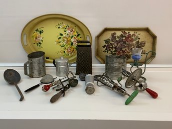 Box Lot Of Vintage Kitchen Items Utensils, 2 Trays, 2 Mixers 2 Sifters, Juicers Ice Cream Scoop Grater, Etc.