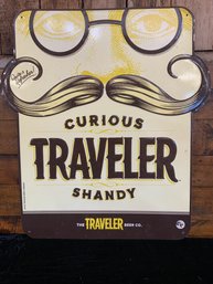 Curious Traveler Shandy Tin Sign 20' Tall 18' Wide