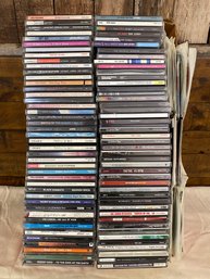 Lot Of 100 CDs Frankie Valle Lynard Skynard INXS Peter Gabriel Annie Lennox Black Eyed Peas Sheryl Crowe Etc.