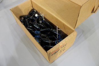 Box Of Around 40 250-500 Microfarad Capacitors