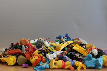 A Box Of Medium And Mini Size Toys, Disney Charlie Brown, Sesame Street, Pooh, And Others Over 100 Pieces