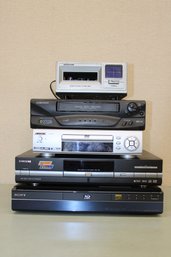 3 DVD Players, 1 VHS Player And 1 8 Track Player All Tested And Work