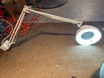 Light With Magnification And Adjustable Arm