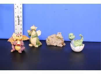 4 Dragon Figurines See Pictures For Condition