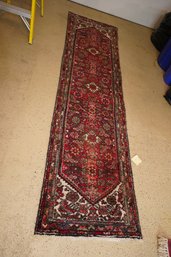 Oriental Style Runner / Rug With Fringe In A Deep Red Hue With Touches Of White, Blue And Green
