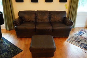 Dark Color Leather Sofa With Pull Out Bed And Matching Ottoman