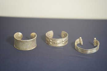 Three Sterling Silver Cuff Bracelets Two With Repousse Details