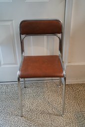 Vintage Brown Cushioned Metal Chair With Tubular Legs