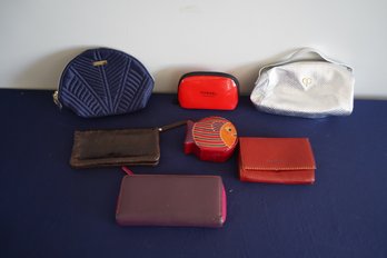 A Collection Of 7 Leather Wallets And Makeup Bags Including A Small Chanel Pouch