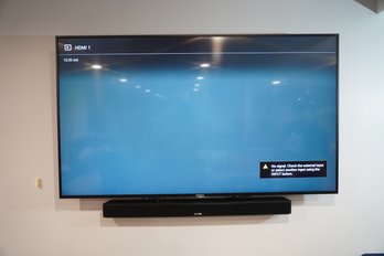 Sony 65' Flat Screen TV With Sound Bar And Sub