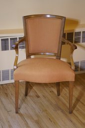 Antique Wood Arm Chair With Orange Cushion