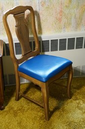 Antique Wood Chair With Bright Blue Cushion