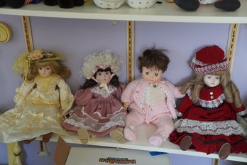 Lot Of 4 Antique Dolls Including Some Porclein Ones.