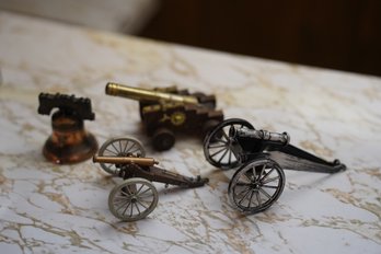 Lot Of 4 Mini Figurines 3 Cannons & 1 Bell