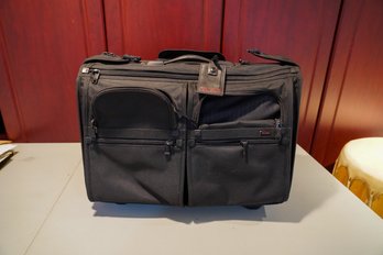 High End Tumi Brand Travel Bag On Wheels