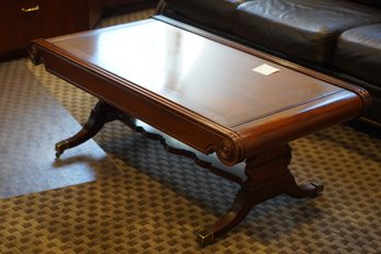 Restored Antique Wood Coffee Table With Brass Feet And Wheels