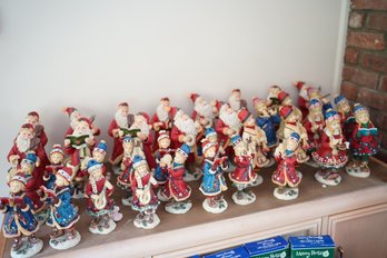 J&S International Inc. - Large Lot Of Christmas Figurines, Includes Santas And Kids Playing Instruments