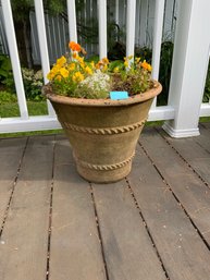 Outdoor Clay Planter With Bright Color Flowers