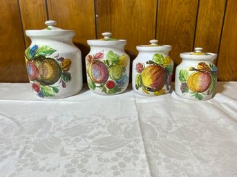 Lot Of 4 Varying Sized Hand Painted Fruit Pattern Cannisters