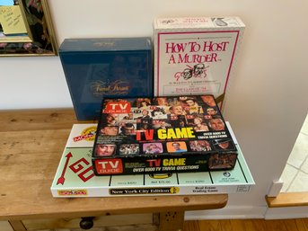 Four Board Games Includes Monopoly And Trivial Pursuit Original Plastic Wrapping