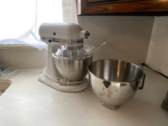 White Kitchen Aid Mixer With Accessories And Stainless Steel Bowl
