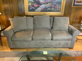 Stylish Neutral Colored Rolled Arm Upholstered Sofa With Removable Cushions And Matching Throw Pillows
