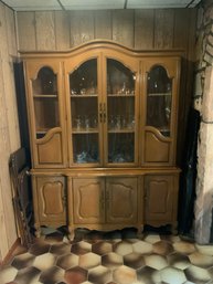 Traditional Wooden Display Cabinet With Shelves Behind Glass And Cabinets Drawers Below