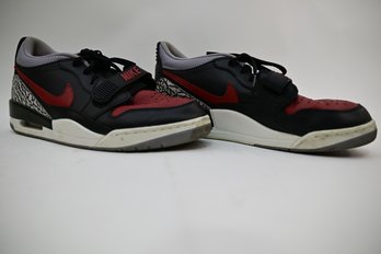 A Pair Of Size 12 Black & Red Air Jordan Sneakers *used*
