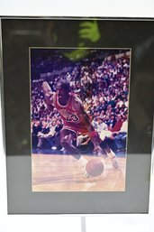 Framed Photograph Of Chicago Bull's Michael Jordan In Action