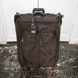 Tumi Brown Colored Rolling Luggage