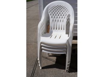 LOT OF 4 OUTDOOR PLASTIC CHAIRS