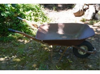 A CLASSIC METAL WHEELBARROW