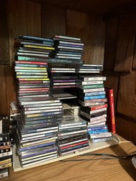 Large Lot Of Cds Vhs Cassettes