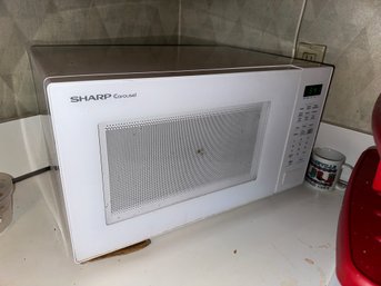Convenient Sharp White Carouse Countertop Microwave Oven