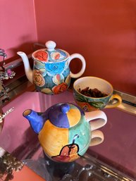 Vintage Hand Painted Pair Of Ceramic Teapots And A Cup